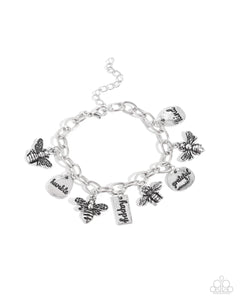 Compassionate Charm - Silver Paparazzi Accessories